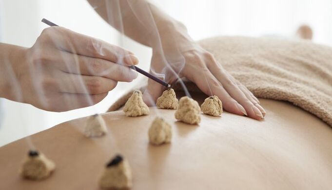 Heating of bioactive points on the back for osteochondrosis.